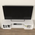 Perry Megapap melamine wall TV furniture in white color 120x29.6x25.6cm.