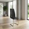 Vela Megapap PU Leather dining chair in black color with chrome base 41x61x107cm.