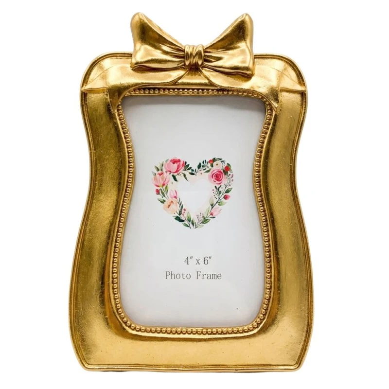 GOLD RESIN BOW PHOTO FRAME 10X15CM