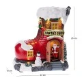 CHRISTMAS RESIN LIGHTED HOUSE BOOT WITH ADAPTOR MOVEMENT AND MUSIC 23X15X25CM