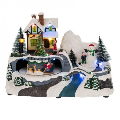 XMAS RESIN LIGHTED VILLAGE WITH MOVING SANTA 24X15X17CM BATTERY OPPERATED