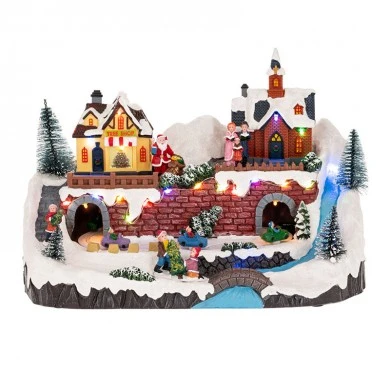 XMAS LIGHTED VILLAGE WITH MOVEMENT INCLUDING ADAPTOR 33X17X22CM