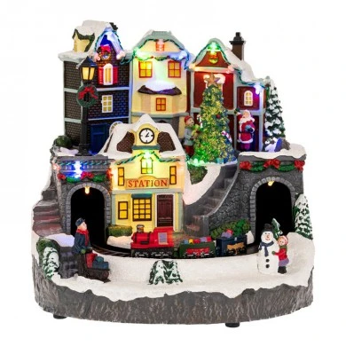 XMAS LIGHTED VILLAGE WITH ANIMATED TRAIN INCLUDING ADAPTOR 24.5X23X23.5CM