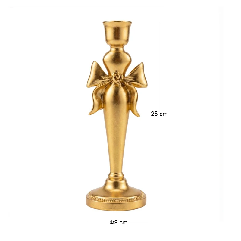 GOLD RESIN CANDLEHOLDER WITH BOW D9X25CM