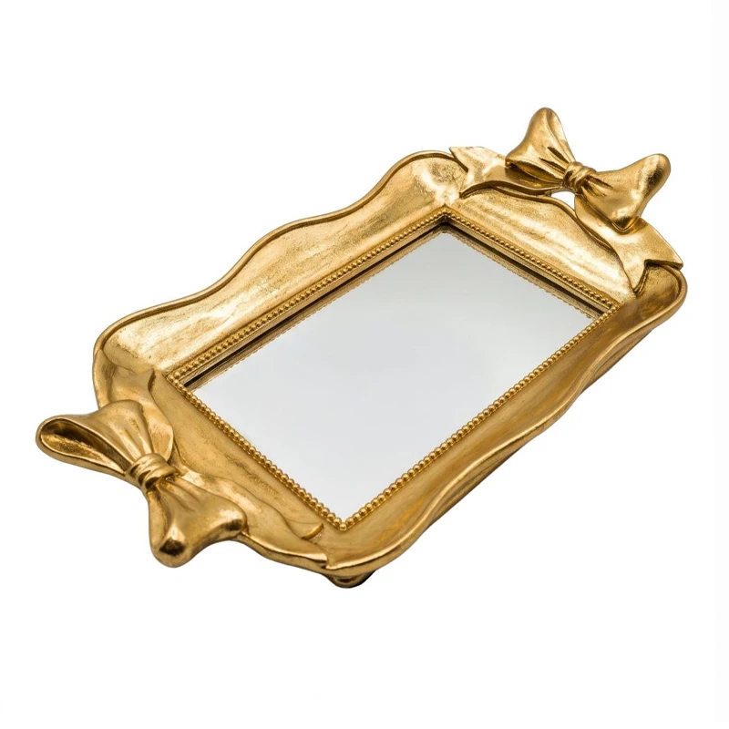 GOLD RESIN TRAY WITH BOWS AND MIRROR 31X17X5,5CM