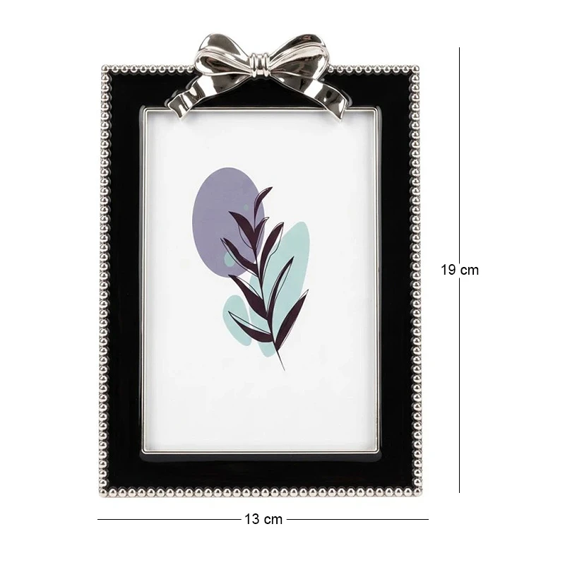 BLACK METAL PHOTO FRAME WITH SILVER BOW AND PEARLS 19Χ13CM