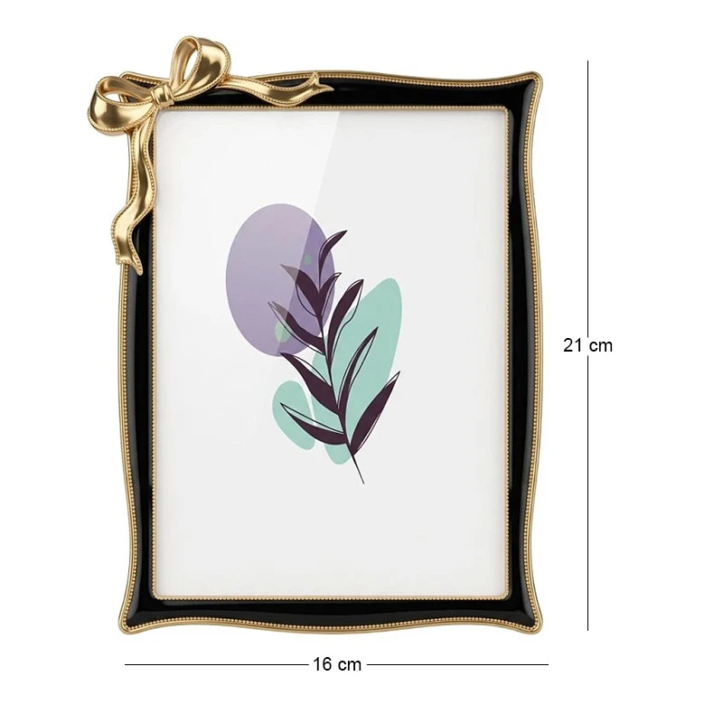 BLACK METAL PHOTO FRAME WITH GOLD BOW 21X16CM