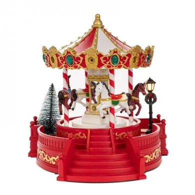 XMAS CAROUSEL WITH LED LIGHTS AND MOVEMENT 22X20X23CM BATTERY OPPERATED