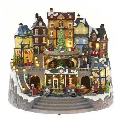 CHRISTMAS VILLAGE ANIMATED WITH LIGHTS MUSIC AND A ROTATING TRAIN 42Χ35Χ37CM