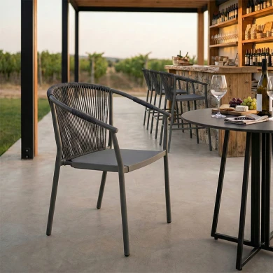 Aluminum armchair Convince pakoworld stackable with grey frame-black textilene-dark grey pe rattan 56x63x82cm